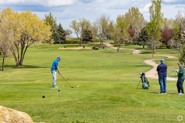 Practice your swing at the Southridge Golf Course, which is intertwined with the Southridge Greens neighborhood.