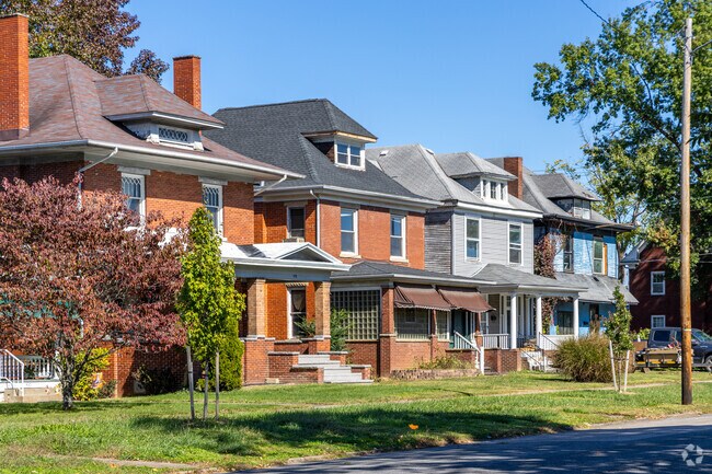 A row of Traditional styled homes found in the Downtown Huntington neighborhood.