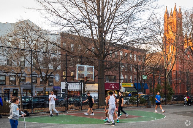 Carroll Carroll Park has many basketball hoops for people to play at.