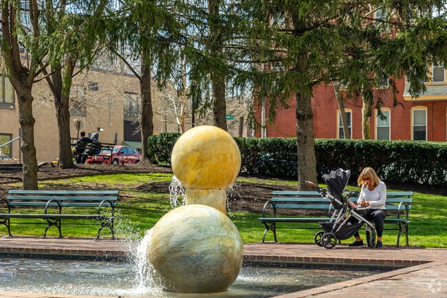 Sit outside on pristine afternoons in Midtown Brandywine along statues and water features.