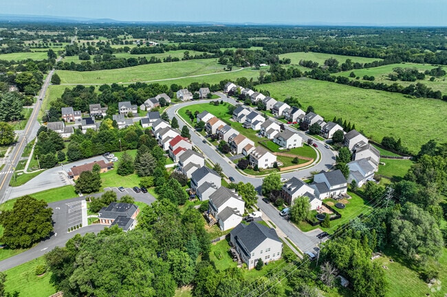 New subdivisions in Boyce feature circular street layouts and are surrounded by the rolling green landscapes of Clarke County.