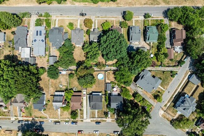 The quaint streets of Wasena encompass a variety of housing styles along tree lined streets.