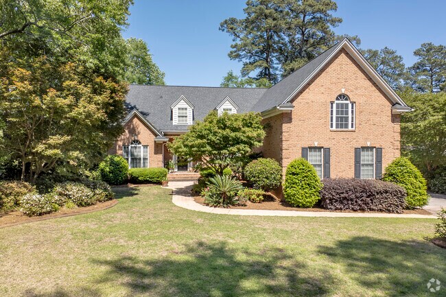 In current builds, dormers or second stories were often added to Cape Cod style homes.