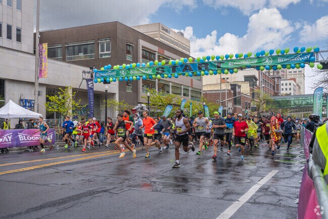 Runners dash from the starting line for Bloomsday 2024.