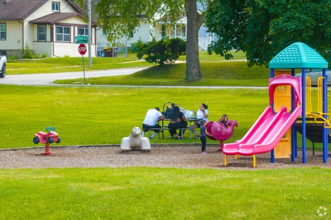 Andrews Park has picnic tables to sit and relax.