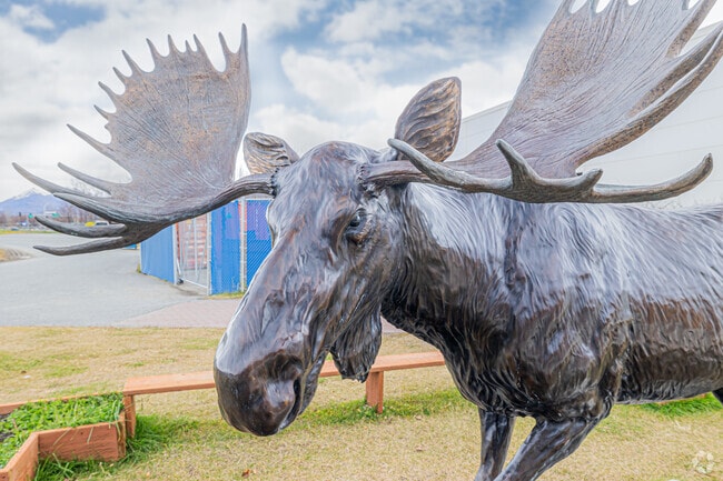A moose statue sits out front welcoming Palmer High School Students.