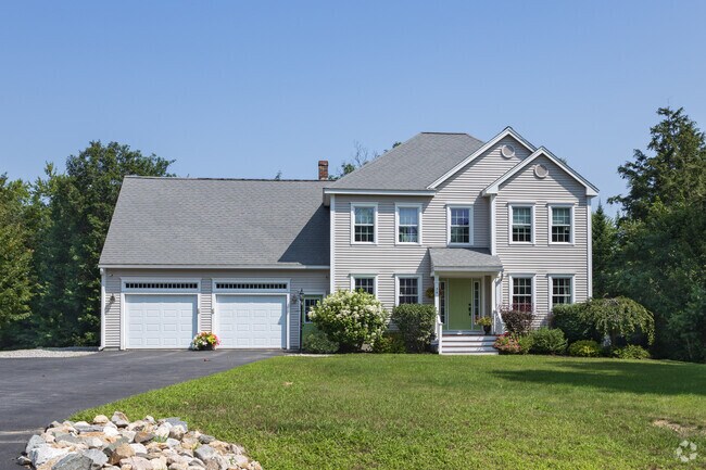 This stately Colonial with a multi-pitched roof can be found in Lake Arrowhead.