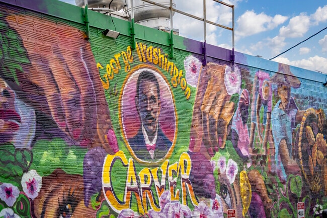 Artists in Minock Park use a building to display their artwork.