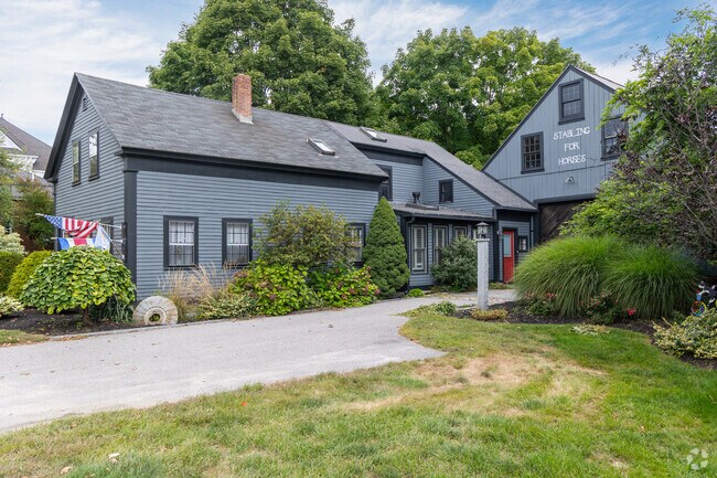 Experience the quaint charm of Cape Cod-styled homes in Hollis with cozy designs & gabled roofs.