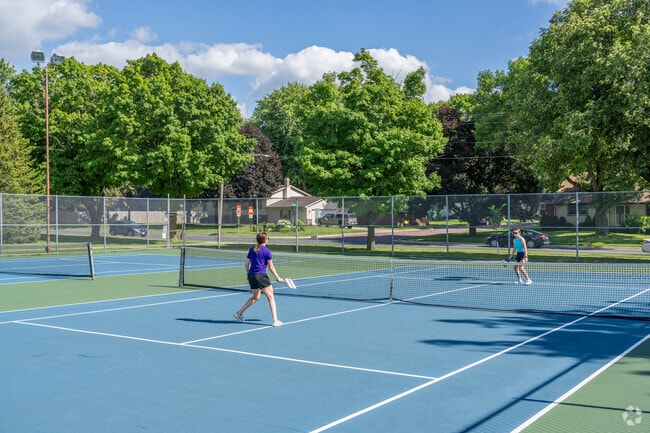 Erlandson Park has a tennis court.