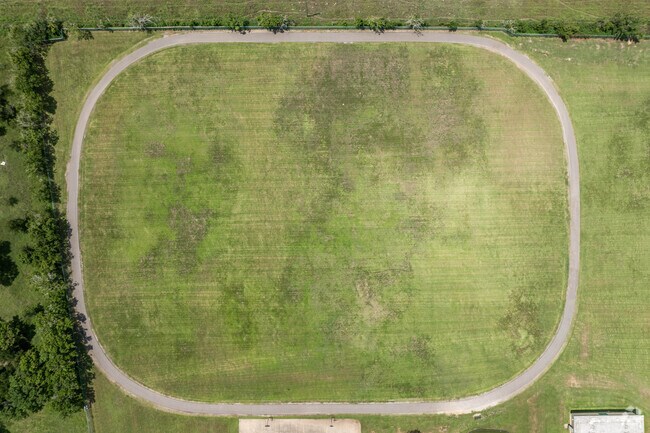 Students appreciate the expansive green space and track at S.F. Austin Elementary.