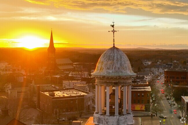 The sun sets over Downtown Biddeford.