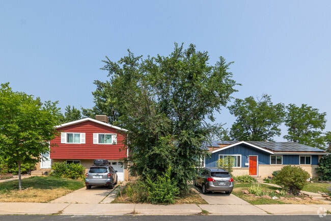 Southeast Boulder homes feature bright exteriors and mature trees for a charming street view.