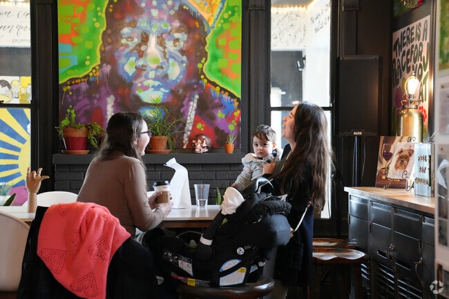 There are many beautiful murals inside Fringe Coffeehouse.