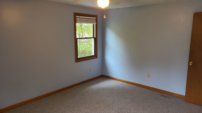 2nd Bedroom with full closet and crawlspace
