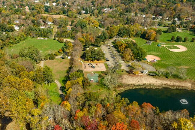 Hollow Park has a playground, pond, walking trails, and ballfields.