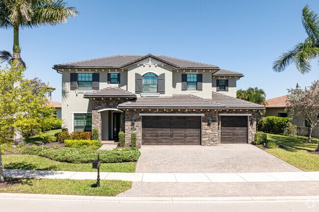 Beautiful rock facade details are on some homes in Watercrest at Parkland.