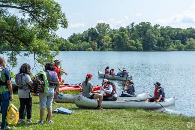 Boaters get ready for launch at the canoe area of Kids' Fest in Thornton.
