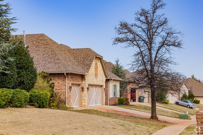 Modern ranch-style homes in Coffee Creek showcase tidy lawns.