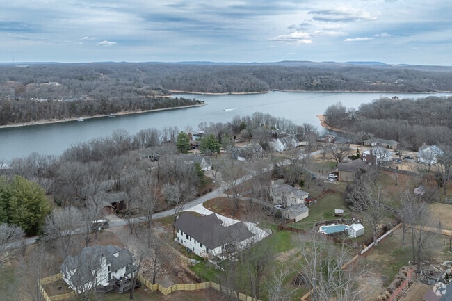 Homes east of Rogers include lakefront properties along Beaver Lake.