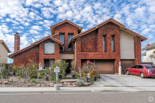 Here is a classic large shake shingle home in La Costa.