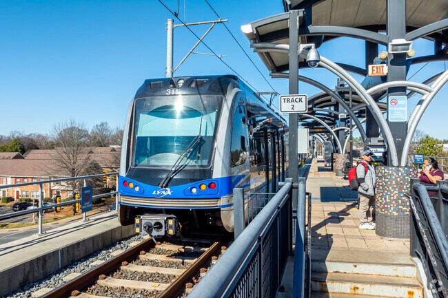 Locals find it easy and inexpensive to catch the train running uptown.