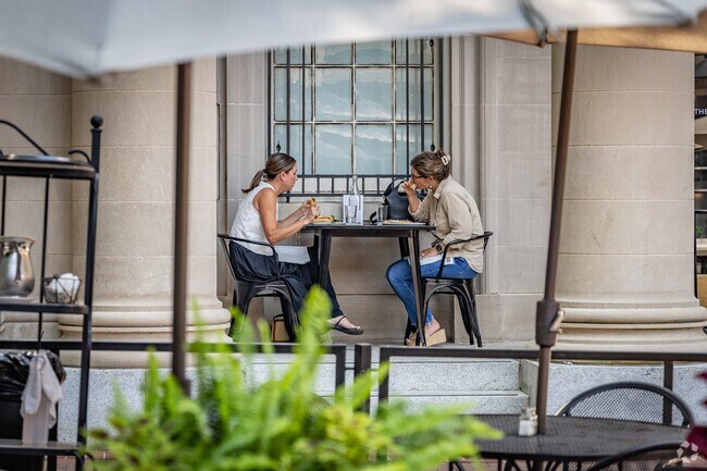 Friends meet for food and great conversation at the Historic Downtown Mall near Ridge Street.