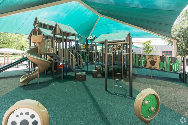 Locals love the shaded playground at Canyon Country Park.