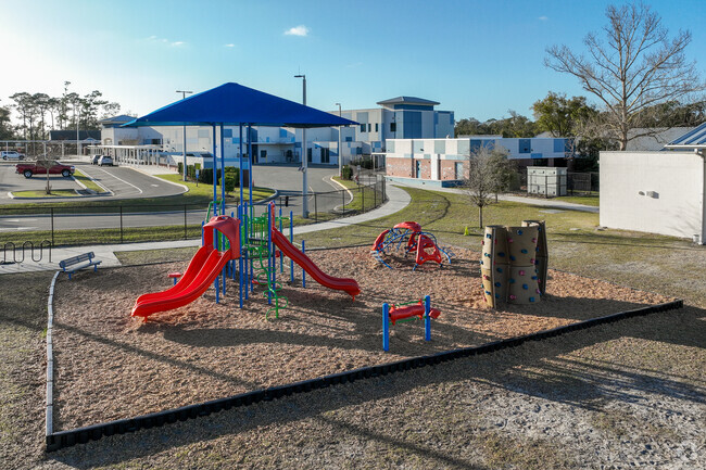 George W Marks Elementary School features multiple outdoor play areas for Deland students.