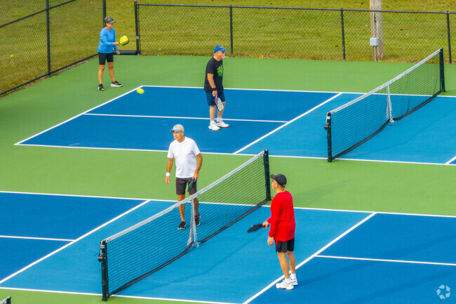 Spend time on the pickleball court in the morning in Cresthaven.