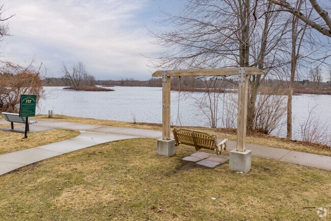 Riverside green spaces like Ives Park in Potsdam offers riverfront views of the Raquette River.
