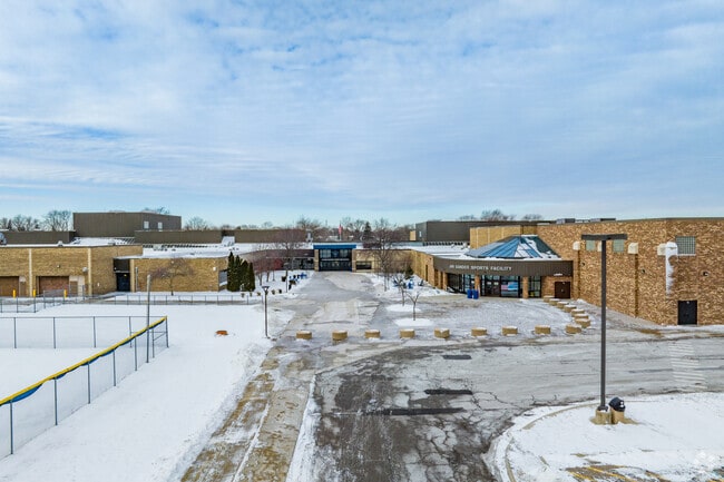 Warren Woods Tower High School and Jan Sander Sports Facility.