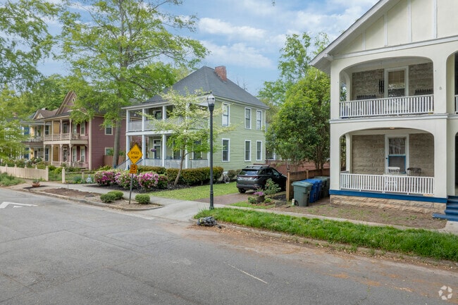Apartment buildings stand among early 1900s single-family homes in Elmwood Park.