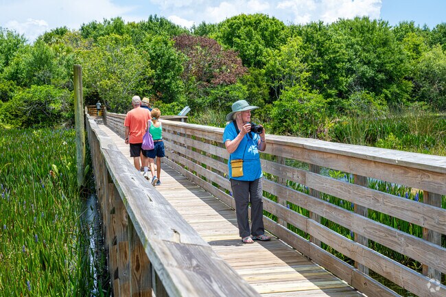 Exploring the beautiful Green Cay Nature Center & Wetlands is priceless near Polo Trace.