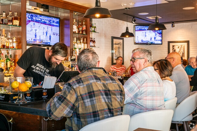 Residents of Palm Springs catch up with family and friends at Giuseppe's Pizzeria.