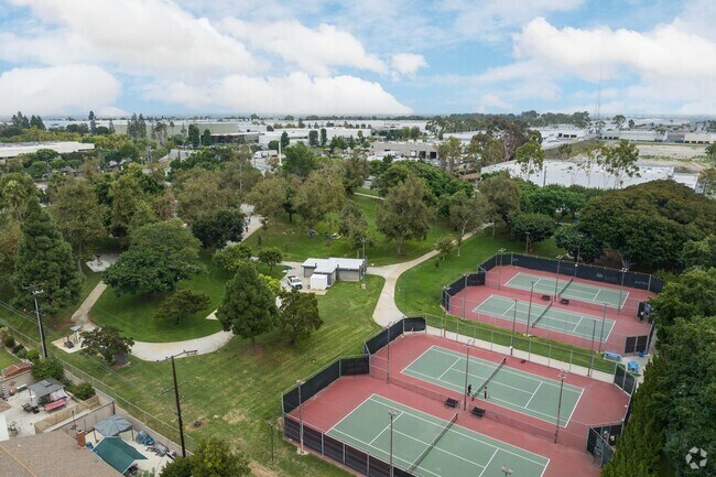 James Anderson Park in Rancho Dominguez offers many tennis courts and paved walking paths.