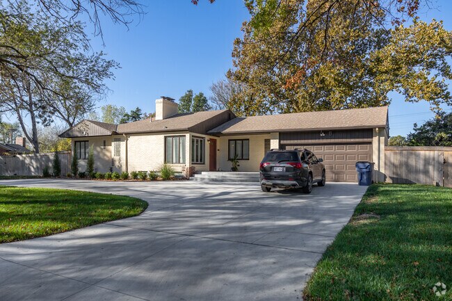 This Village homes has a circle drive.