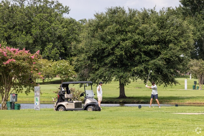 Laplace residents enjoy a game of golf on the Riverlands Golf Course.