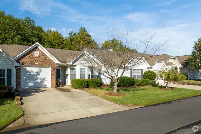 Manicured landscaping and well-kept homes create a strong sense of community in Whitehall.
