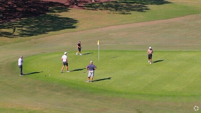 Socialize and play golf with neighbors at the Seven Oaks Country Club