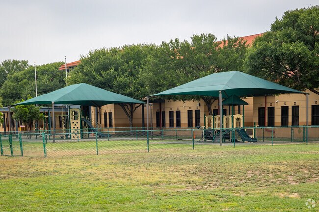 Students an study in the courtyard of Wilson Elementary.