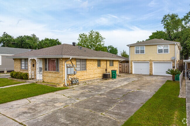Large driveways and detached garages are a staple of the Metairie Terrace neighborhood.