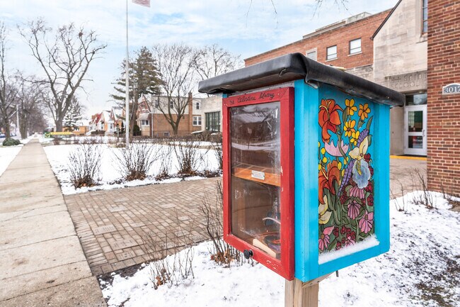 St. Celestine School has a free little library near its entry.