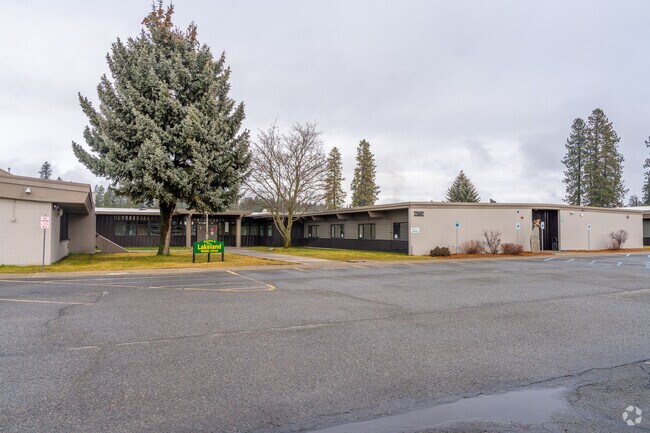 Lakeland Middle School features a large parking lot in front of the school.