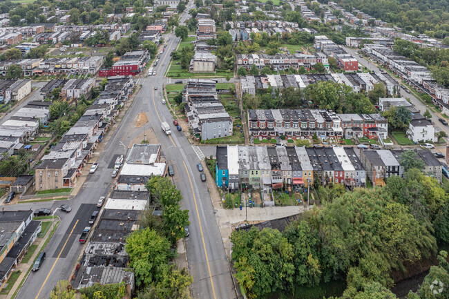 Franklintown Road primarily consists of traditional row-homes nestled in wooded areas.