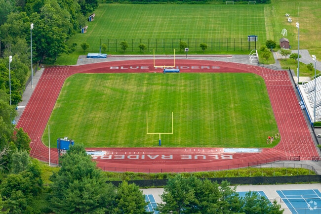 Charles O. Dickerson High School features a large track and football field.