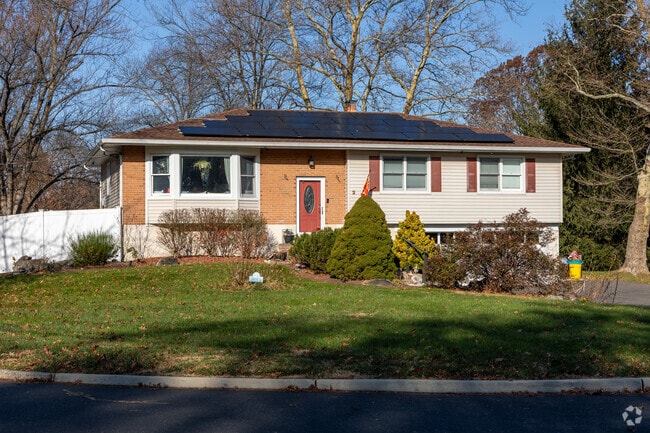Homeowners in East Windsor are adding solar panels to help conserve energy.