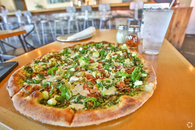 Grab a Greenville Goddess Pizza at Sidewall in Travelers Rest or one of the other locations.