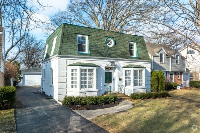 Smaller painted brick homes with mansard roofs can be found in the Village of Skokie.