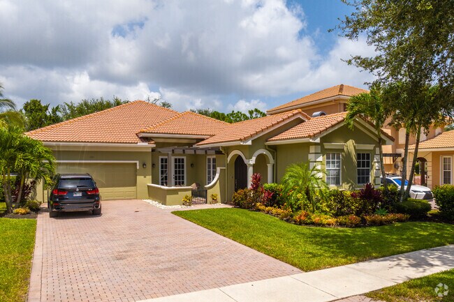 Paseos single family homes with terracotta roofs.